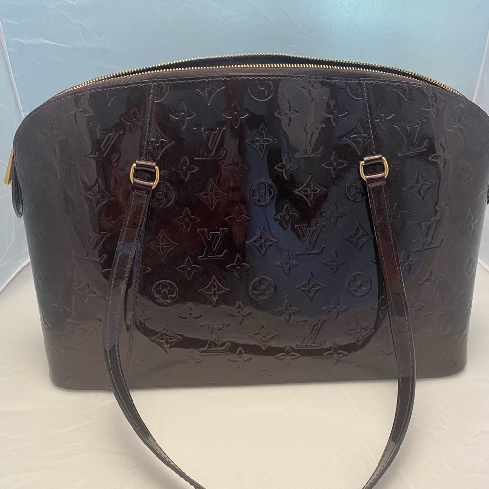 Louis Vuitton Avalon Zip. MV Amarante Vernis color